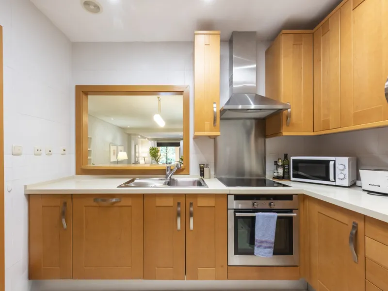 This modern and inviting two-bedroom apartment, nestled within the exclusive Las Mimosas complex, offers a truly exceptional living experience.