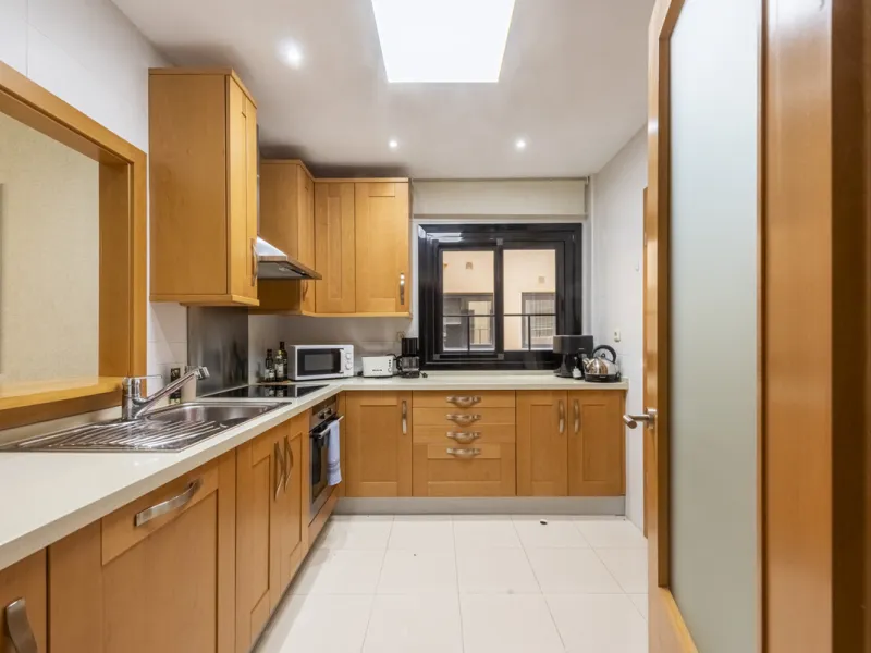 This modern and inviting two-bedroom apartment, nestled within the exclusive Las Mimosas complex, offers a truly exceptional living experience.