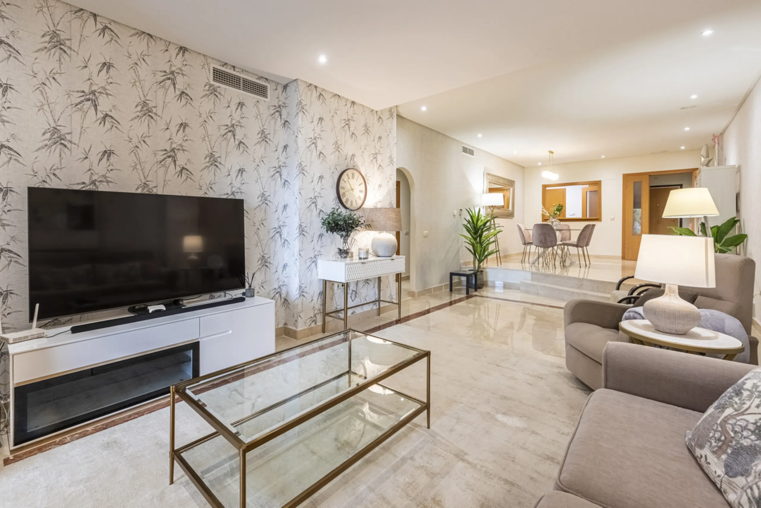 This modern and inviting two-bedroom apartment, nestled within the exclusive Las Mimosas complex, offers a truly exceptional living experience.
