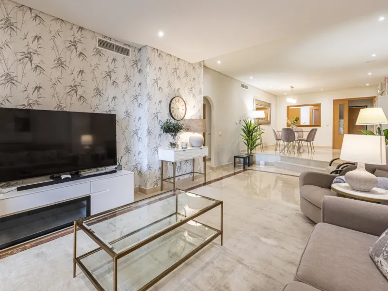 This modern and inviting two-bedroom apartment, nestled within the exclusive Las Mimosas complex, offers a truly exceptional living experience.