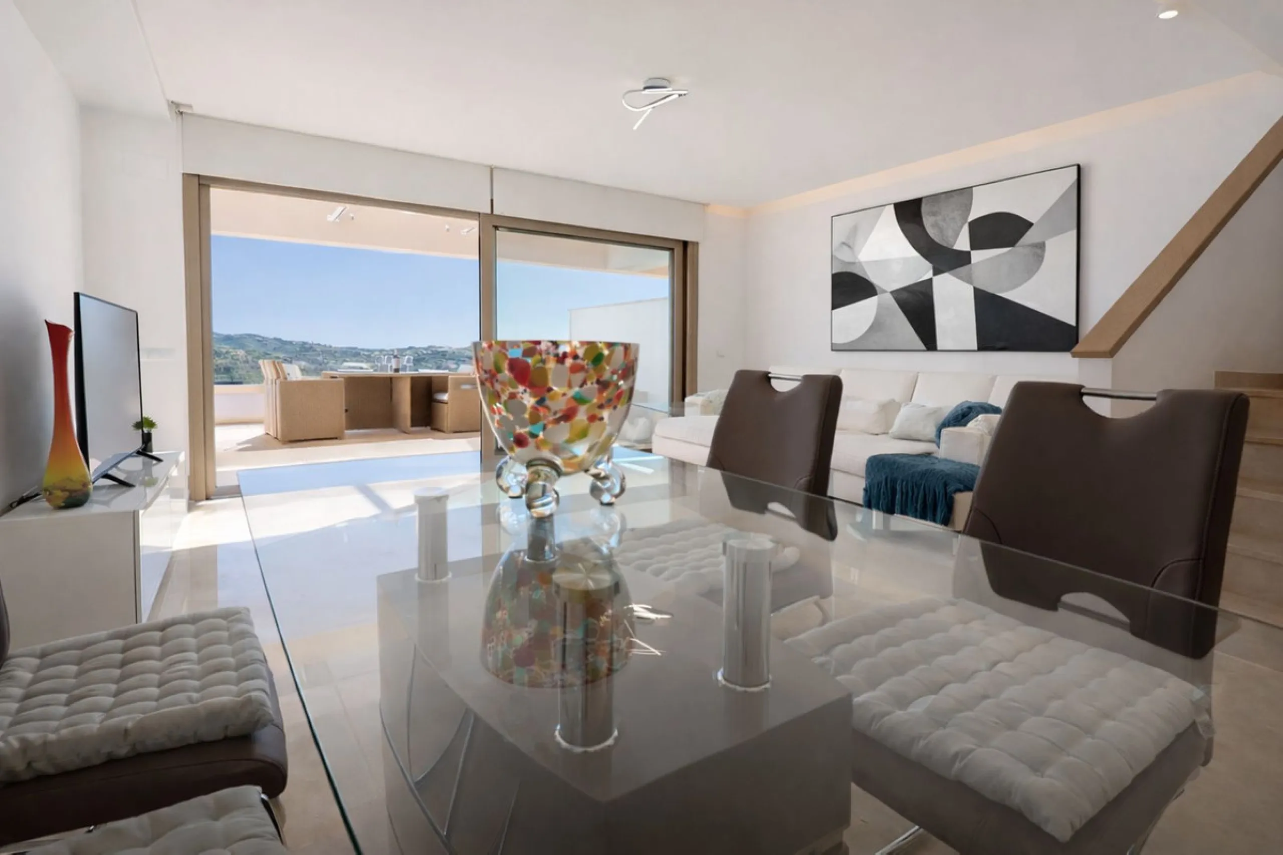 This elegant contemporary townhouse combines space, natural light and clean architectural lines, offering seamless indoor-outdoor living in a peaceful, high-quality setting. Finished with marble flooring throughout and a private elevator connecting all fl
