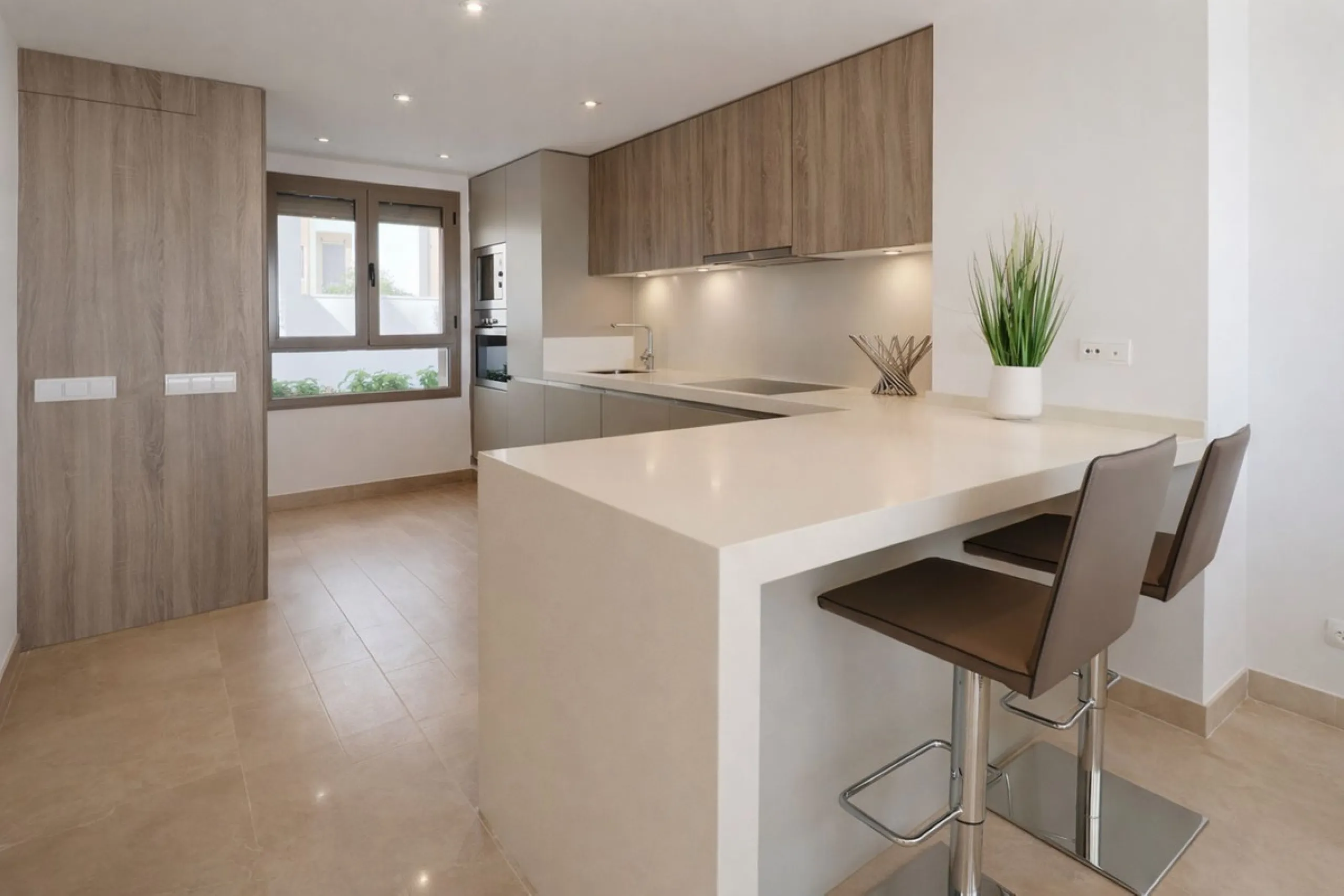 This elegant contemporary townhouse combines space, natural light and clean architectural lines, offering seamless indoor-outdoor living in a peaceful, high-quality setting. Finished with marble flooring throughout and a private elevator connecting all fl