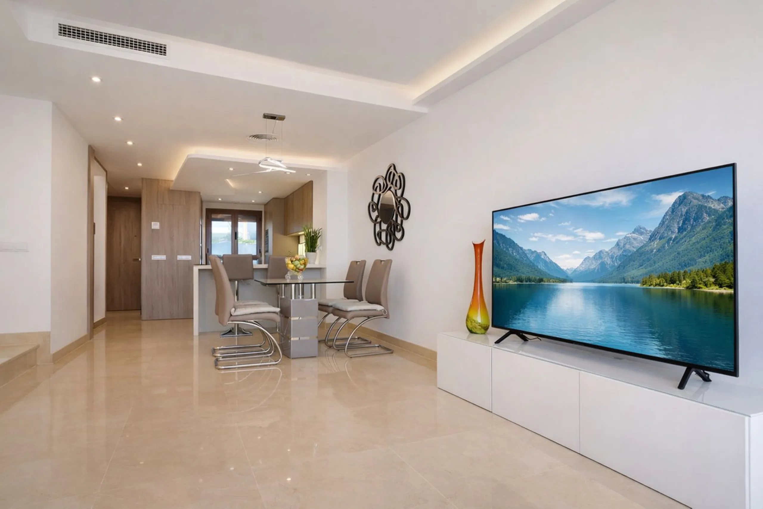 This elegant contemporary townhouse combines space, natural light and clean architectural lines, offering seamless indoor-outdoor living in a peaceful, high-quality setting. Finished with marble flooring throughout and a private elevator connecting all fl