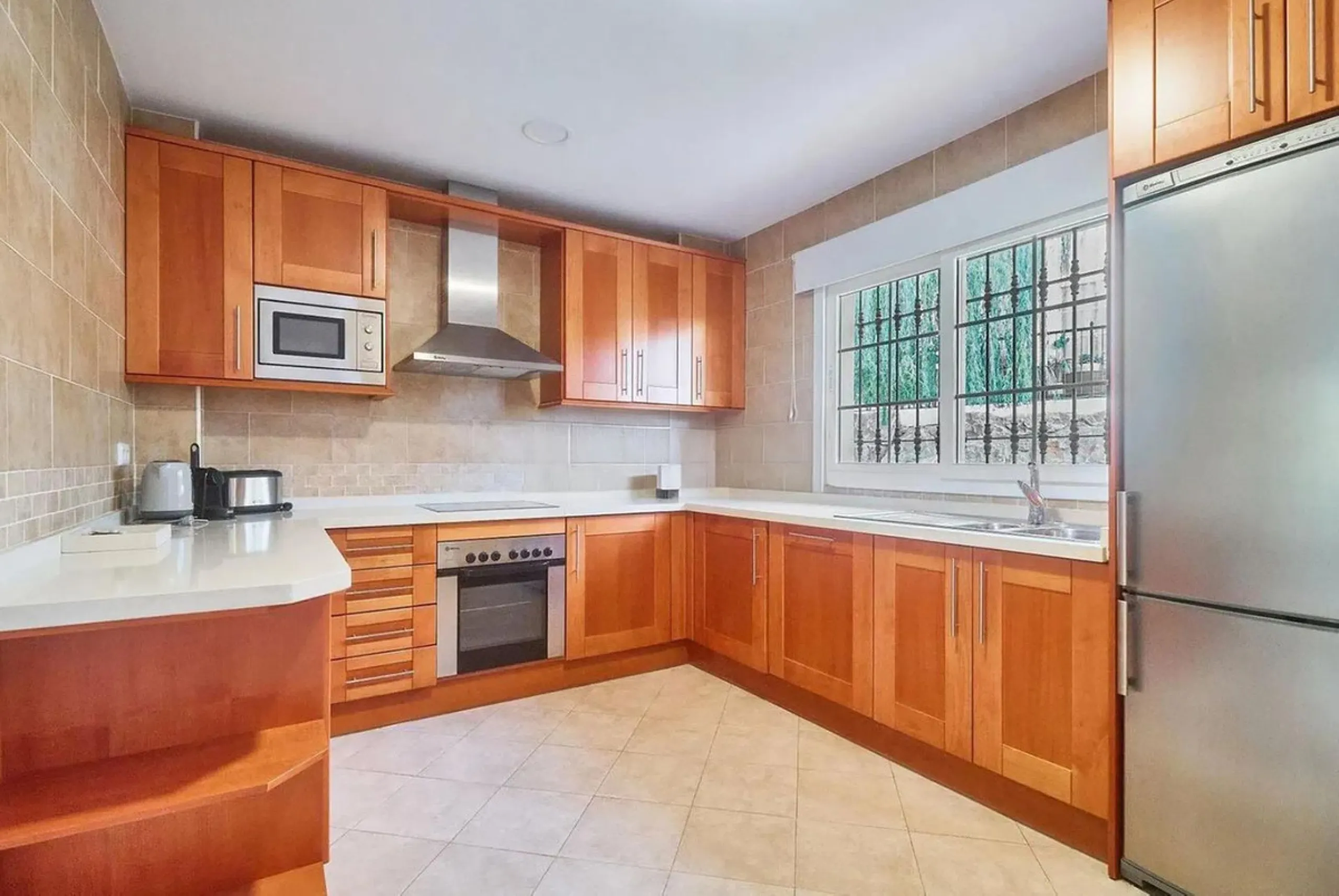Spacious semi-detached house with 3 bedrooms, attic and large terraces in Lauro Golf