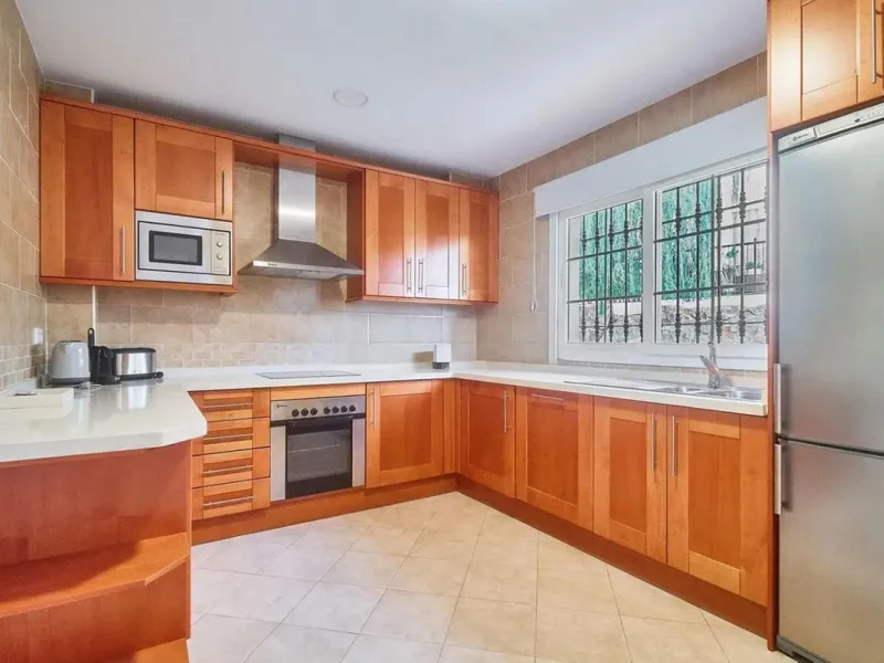 Spacious semi-detached house with 3 bedrooms, attic and large terraces in Lauro Golf