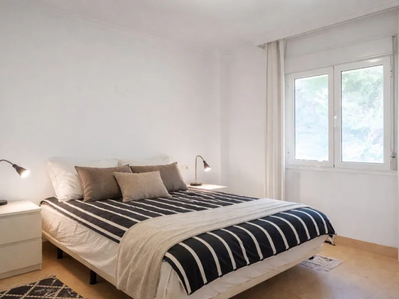This penthouse is a 2 bedroom 2 bathroom duplex penthouse just 1 km from the beach. The home features open plan living spaces with bright interiors and large terrace windows. The kitchen overlooks the lounge and dining area through an elegant archway. The