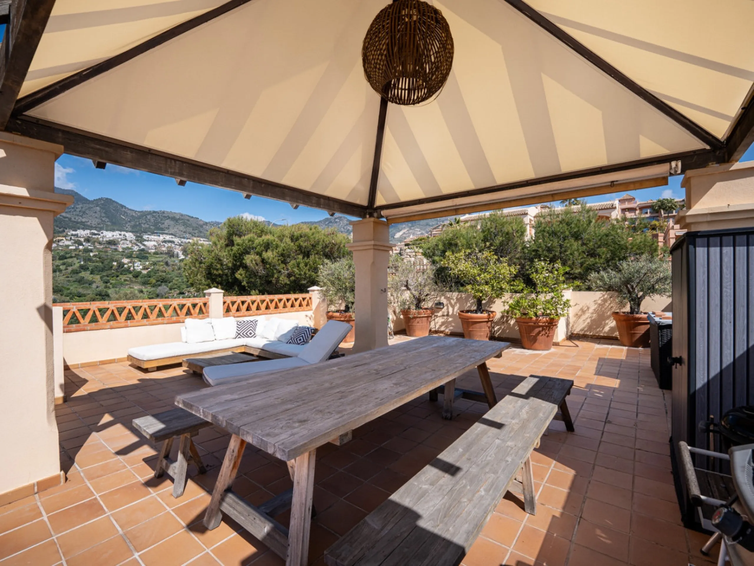 This penthouse is a 2 bedroom 2 bathroom duplex penthouse just 1 km from the beach. The home features open plan living spaces with bright interiors and large terrace windows. The kitchen overlooks the lounge and dining area through an elegant archway. The