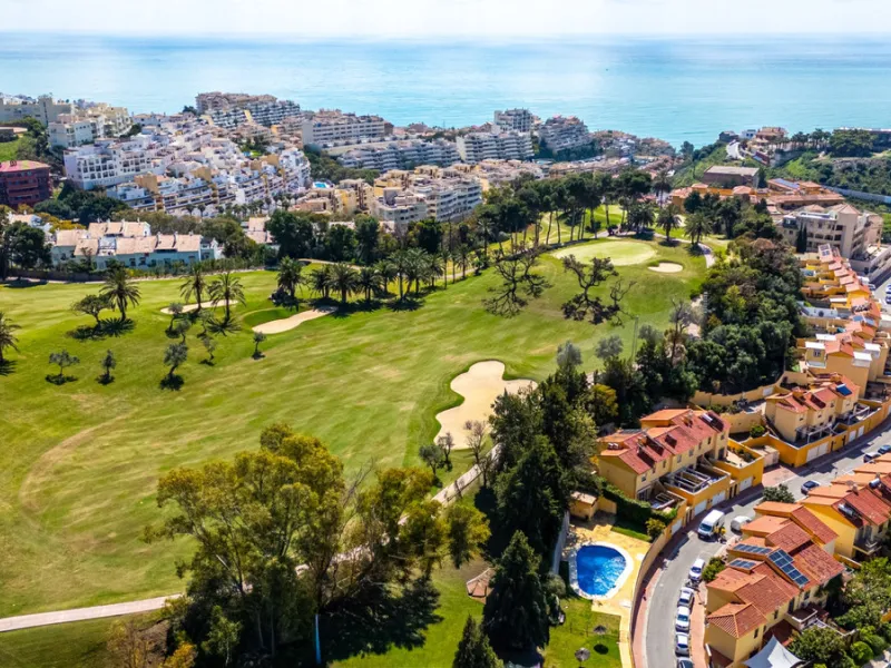 This penthouse is a 2 bedroom 2 bathroom duplex penthouse just 1 km from the beach. The home features open plan living spaces with bright interiors and large terrace windows. The kitchen overlooks the lounge and dining area through an elegant archway. The