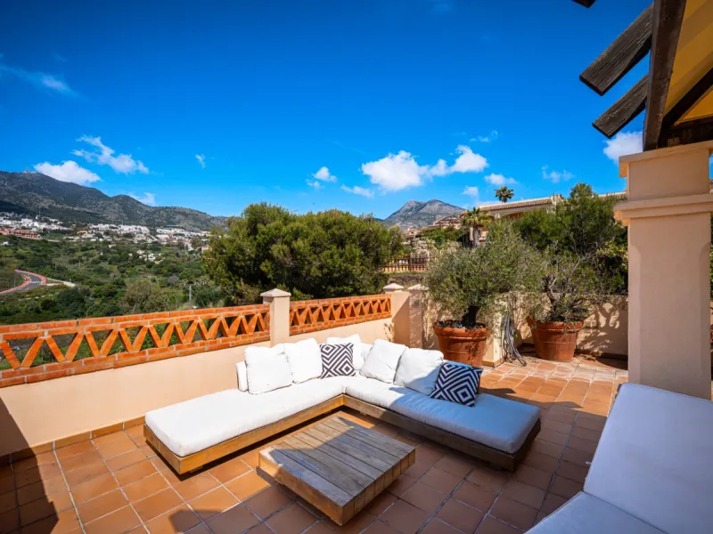 This penthouse is a 2 bedroom 2 bathroom duplex penthouse just 1 km from the beach. The home features open plan living spaces with bright interiors and large terrace windows. The kitchen overlooks the lounge and dining area through an elegant archway. The