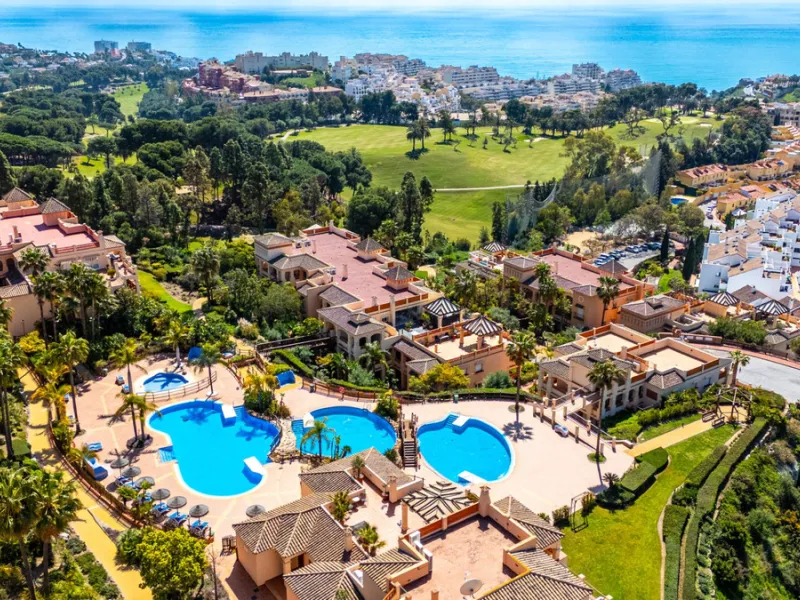 This penthouse is a 2 bedroom 2 bathroom duplex penthouse just 1 km from the beach. The home features open plan living spaces with bright interiors and large terrace windows. The kitchen overlooks the lounge and dining area through an elegant archway. The