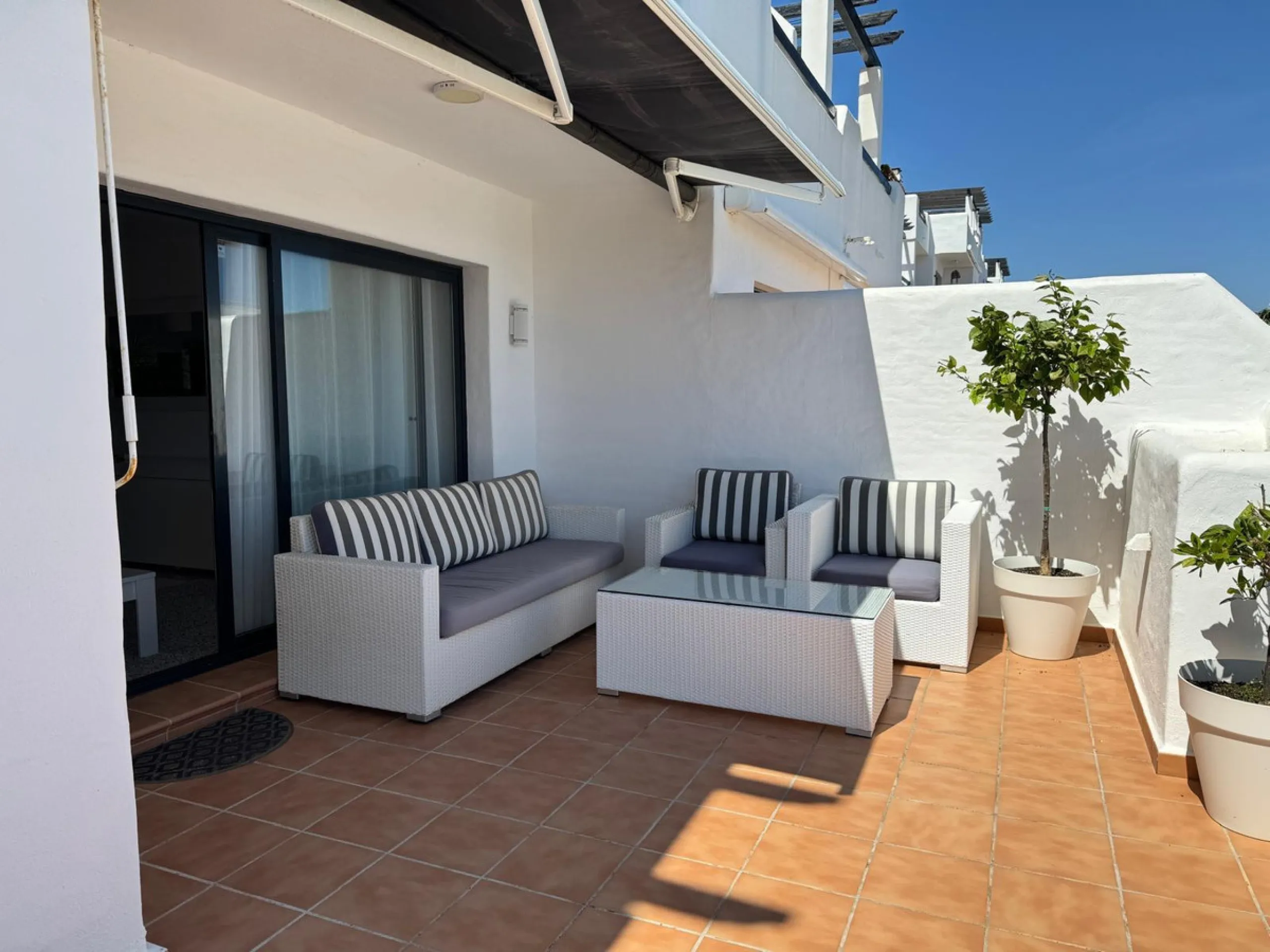 Experience unparalleled coastal living in this immaculate 2-bedroom, 2-bathroom apartment located within the highly sought-after Lotus Dona Julia. Nestled in the heart of Dona Julia Golf Course, the residence comes fully furnished and boasts full frontal 