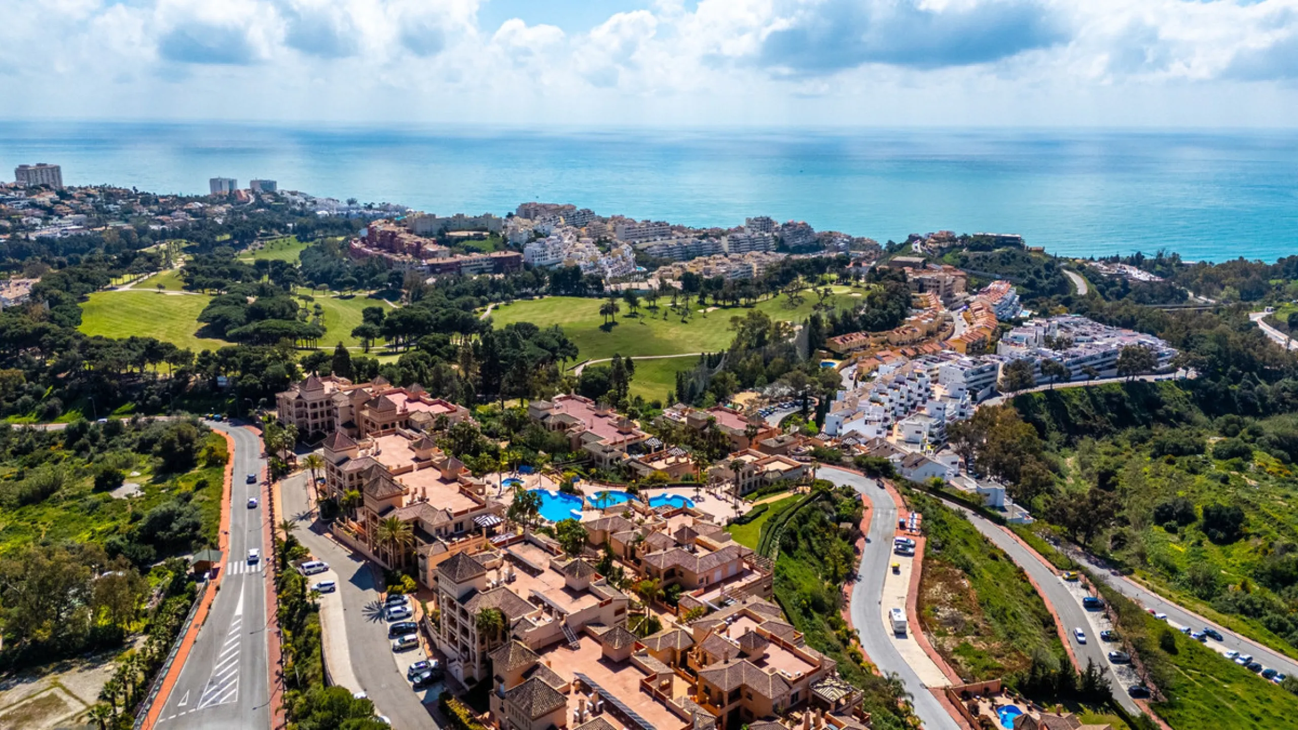 This penthouse is a 2 bedroom 2 bathroom duplex penthouse just 1 km from the beach. The home features open plan living spaces with bright interiors and large terrace windows. The kitchen overlooks the lounge and dining area through an elegant archway. The