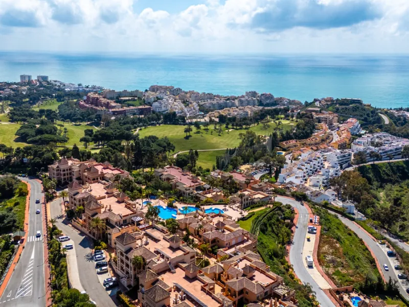 This penthouse is a 2 bedroom 2 bathroom duplex penthouse just 1 km from the beach. The home features open plan living spaces with bright interiors and large terrace windows. The kitchen overlooks the lounge and dining area through an elegant archway. The