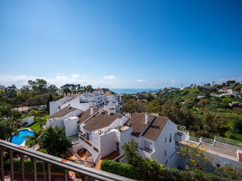 This penthouse is a 2 bedroom 2 bathroom duplex penthouse just 1 km from the beach. The home features open plan living spaces with bright interiors and large terrace windows. The kitchen overlooks the lounge and dining area through an elegant archway. The
