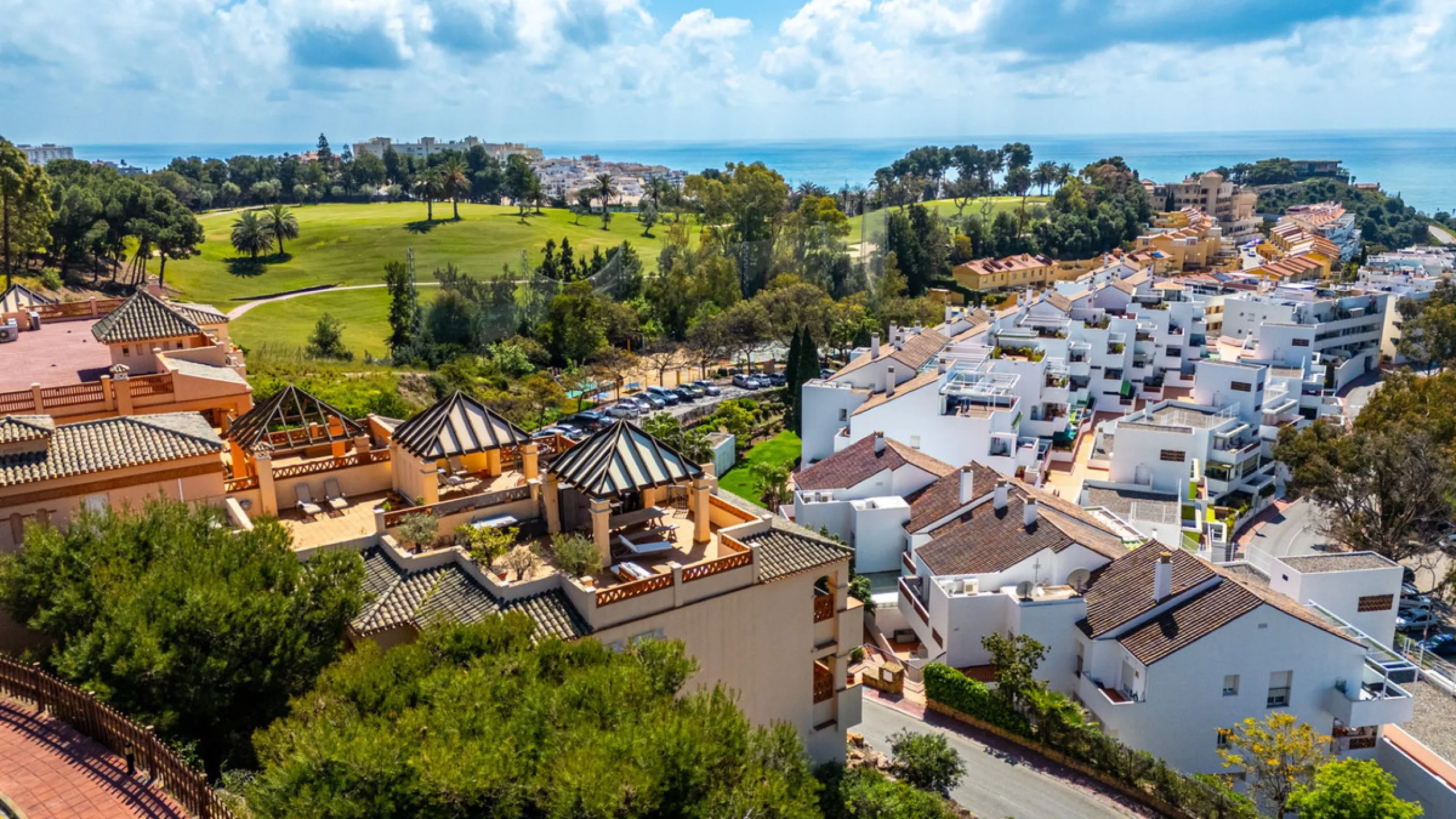 This penthouse is a 2 bedroom 2 bathroom duplex penthouse just 1 km from the beach. The home features open plan living spaces with bright interiors and large terrace windows. The kitchen overlooks the lounge and dining area through an elegant archway. The