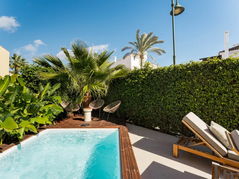 This stunning beachside home for sale in Azalea Beach has been recently refurbished to the highest standards, combining elegant Scandinavian design with a privileged location just a few minutes' walk from the iconic Puerto Banús. Perfectly positioned betw