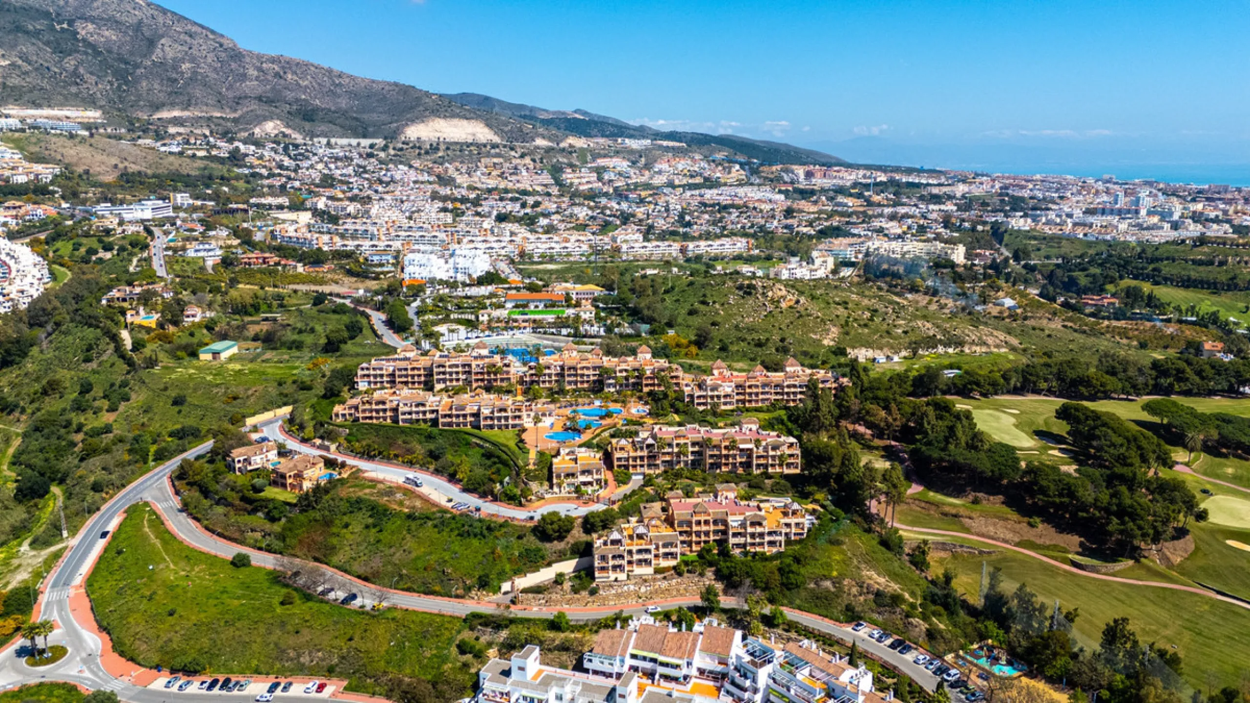 This penthouse is a 2 bedroom 2 bathroom duplex penthouse just 1 km from the beach. The home features open plan living spaces with bright interiors and large terrace windows. The kitchen overlooks the lounge and dining area through an elegant archway. The
