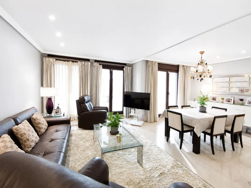 Ground floor apartment with private garden, open views, and 4 communal swimming pools.