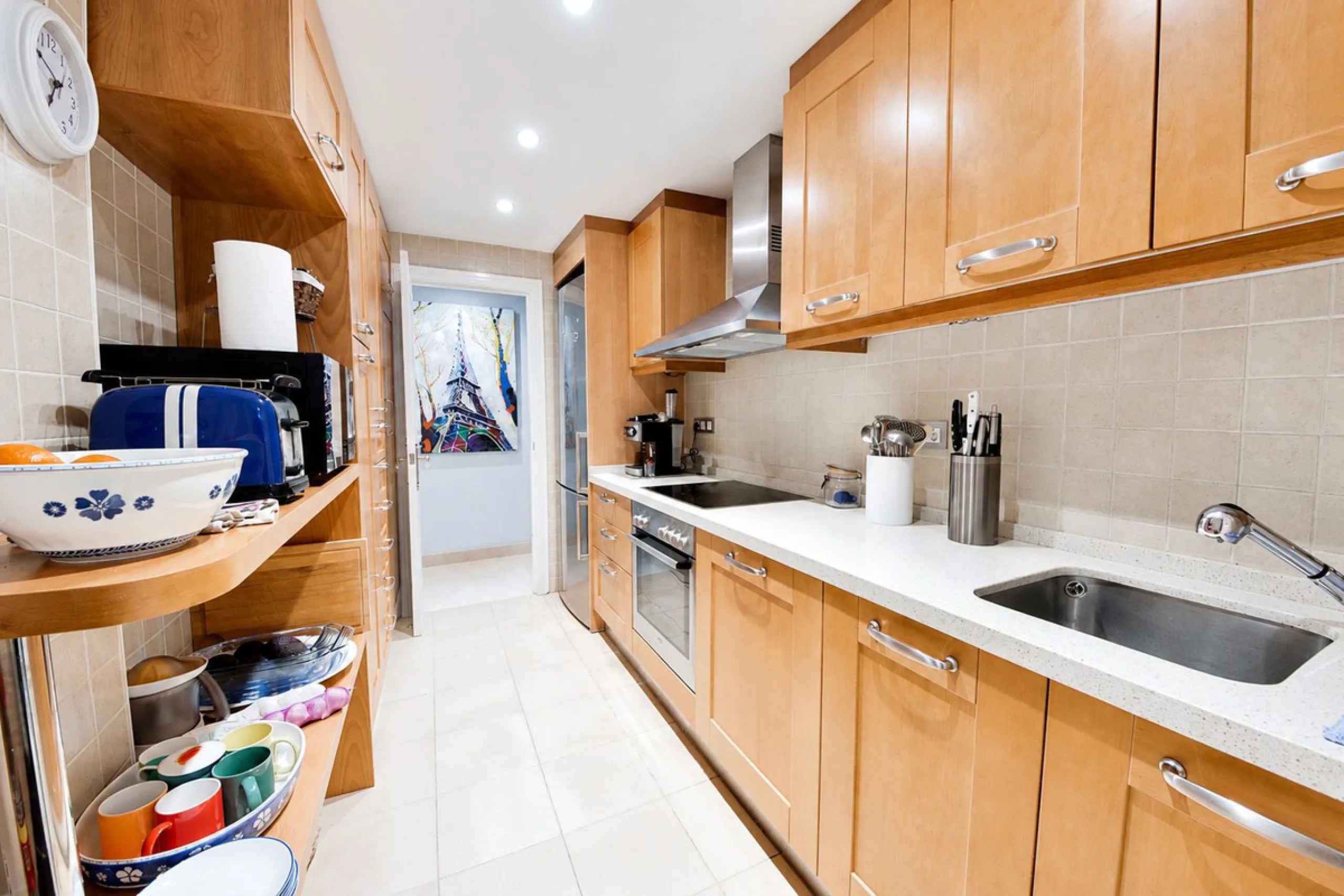 Ground floor apartment with private garden, open views, and 4 communal swimming pools.