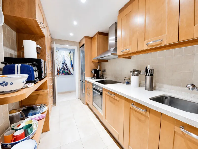 Ground floor apartment with private garden, open views, and 4 communal swimming pools.