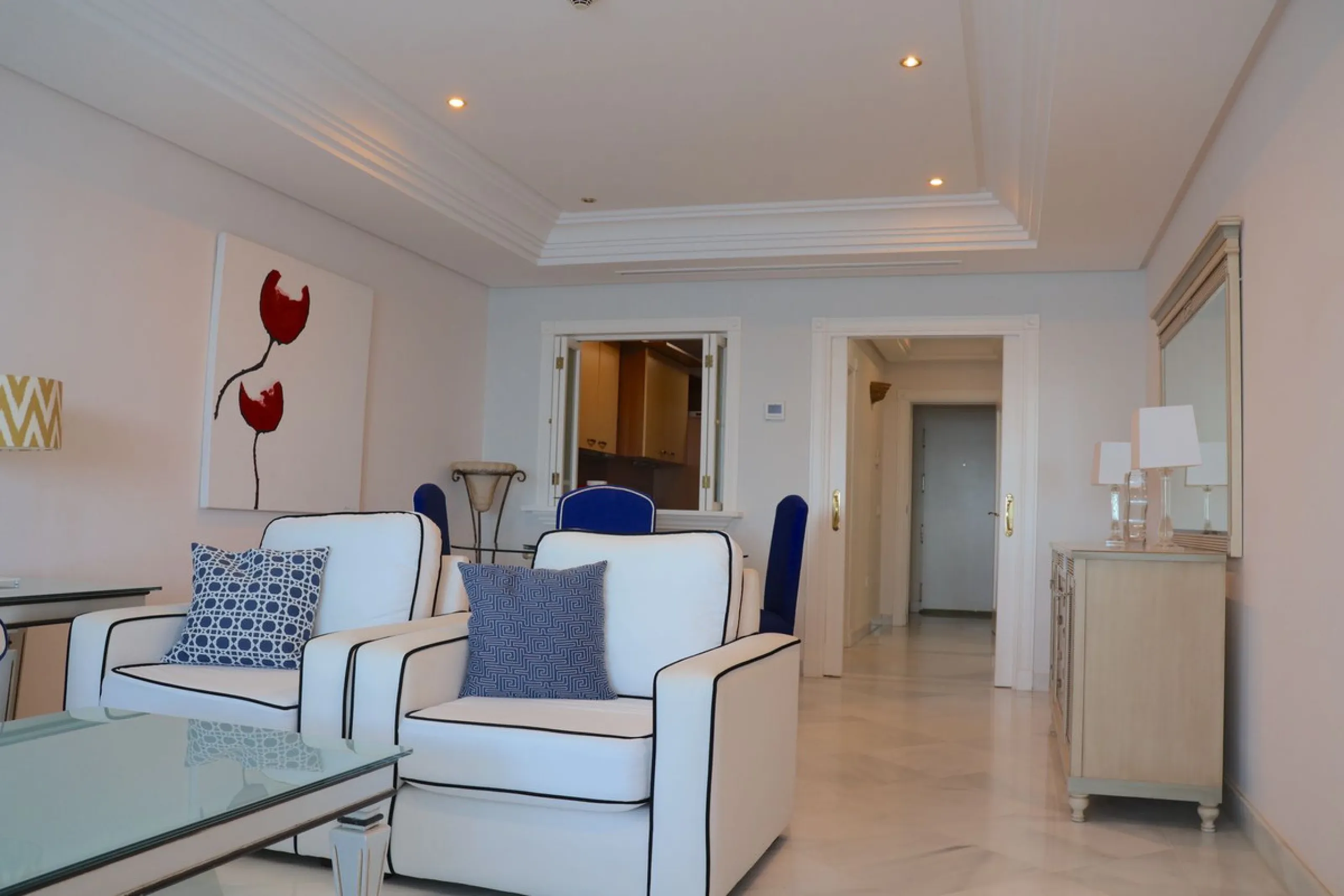 A unique opportunity to acquire a luxurious apartment in the coveted frontline beach of Marbella! This exclusive second-floor apartment in the Marina Mariola Building offers a stunning frontal view of the Mediterranean Sea. It comprises 2 spacious bedroom