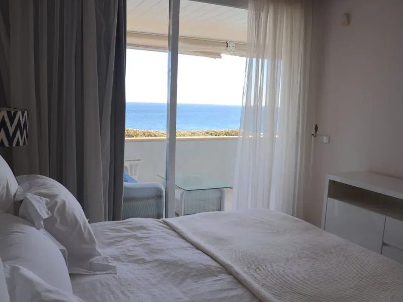 A unique opportunity to acquire a luxurious apartment in the coveted frontline beach of Marbella! This exclusive second-floor apartment in the Marina Mariola Building offers a stunning frontal view of the Mediterranean Sea. It comprises 2 spacious bedroom