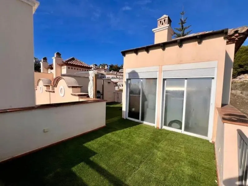 This exclusive duplex apartment is located in a peaceful residential area of Benahavís, surrounded by nature and with pleasant open views of the Mediterranean Sea and the mountains. Just a few minutes away is the Los Halcones shopping center, where you wi