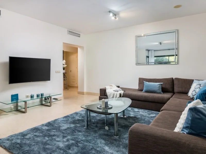 Capanes del Golf is a luxury development located between the coast and the village of Benahavis and only 15 minutes to the famous Puerto Banus and Marbella. The living room has direct access to the large north east facing terrace; the kitchen is fully fit