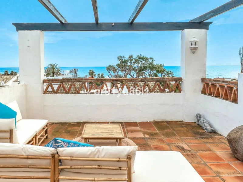 Townhouse Close to the Beach in Costabella Located within a gated, secure community in Costabella, just a short stroll from the beach, this three-bedroom, two-bathroom townhouse features a bright, spacious interior comprising a cosy living room with firep
