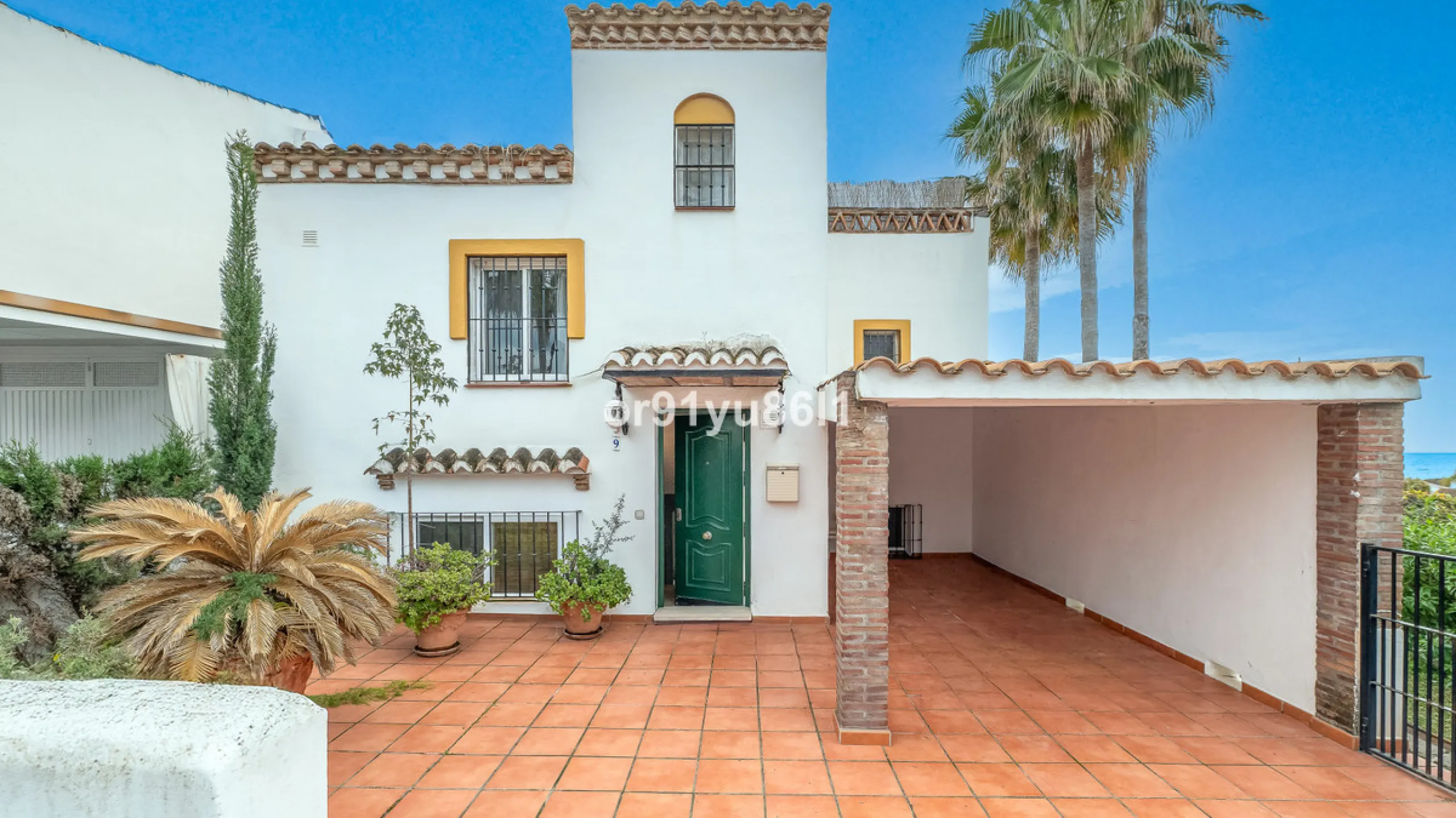 Townhouse Close to the Beach in Costabella Located within a gated, secure community in Costabella, just a short stroll from the beach, this three-bedroom, two-bathroom townhouse features a bright, spacious interior comprising a cosy living room with firep