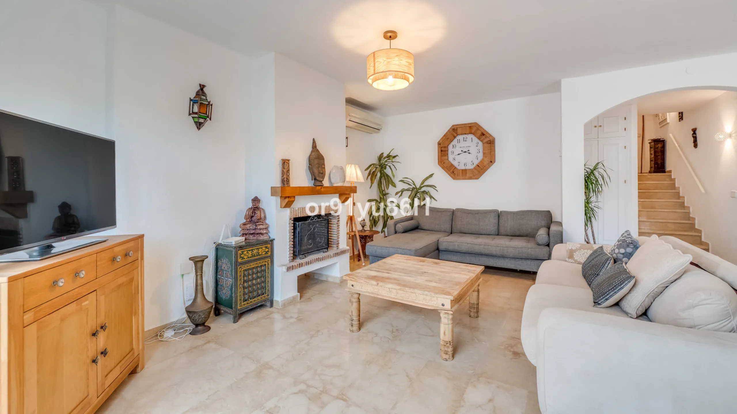 Townhouse Close to the Beach in Costabella Located within a gated, secure community in Costabella, just a short stroll from the beach, this three-bedroom, two-bathroom townhouse features a bright, spacious interior comprising a cosy living room with firep