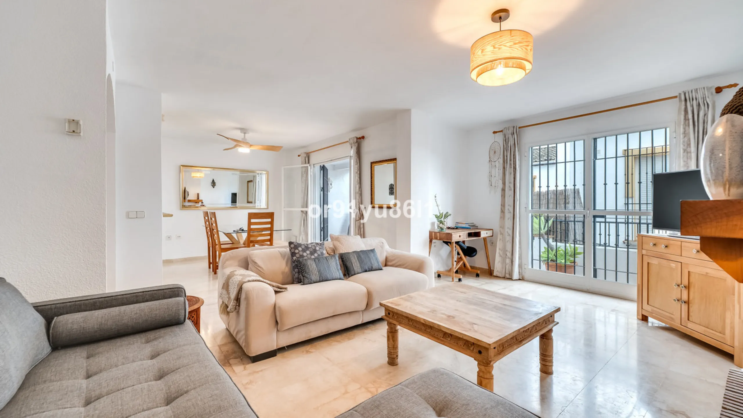 Townhouse Close to the Beach in Costabella Located within a gated, secure community in Costabella, just a short stroll from the beach, this three-bedroom, two-bathroom townhouse features a bright, spacious interior comprising a cosy living room with firep