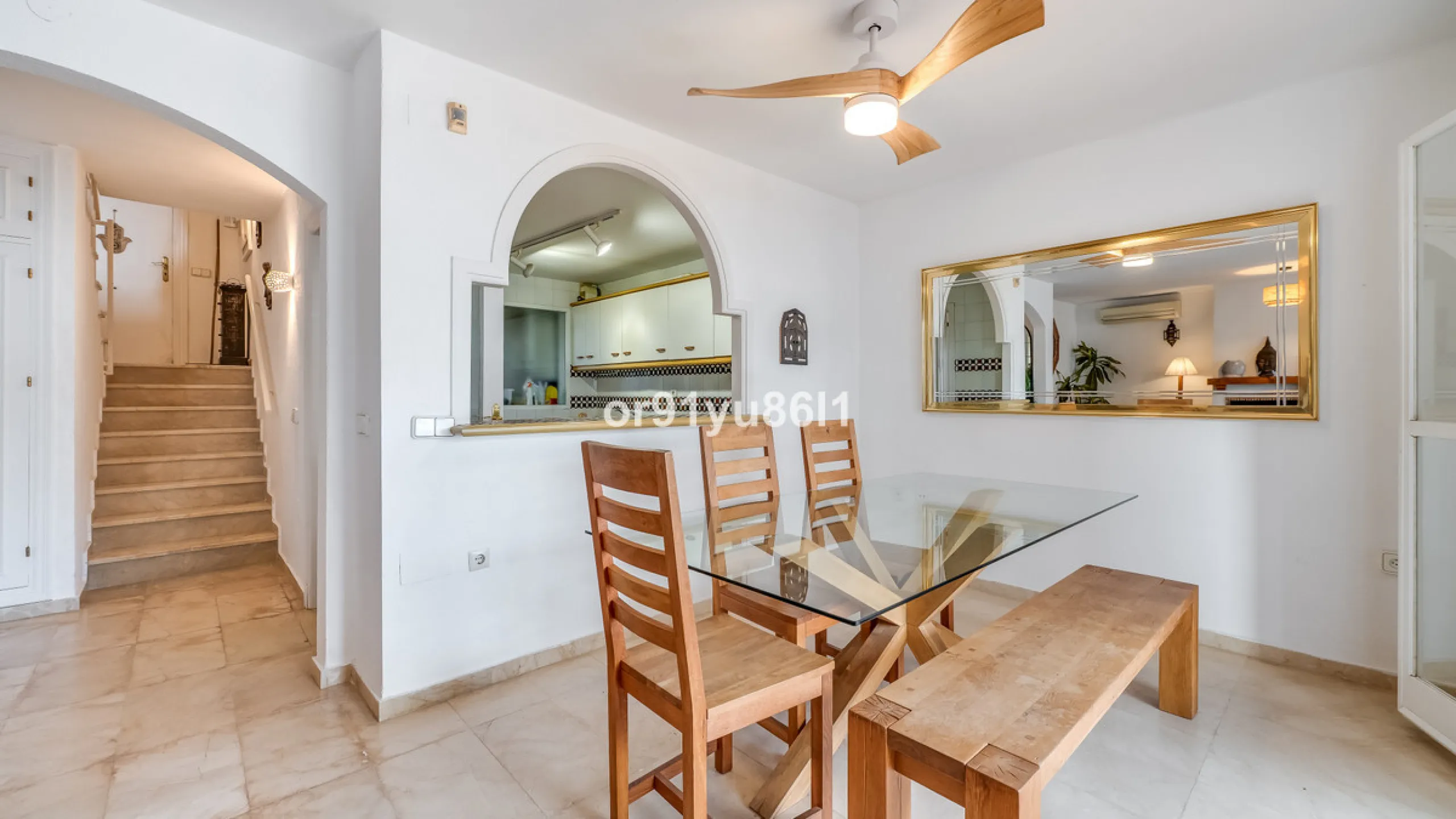 Townhouse Close to the Beach in Costabella Located within a gated, secure community in Costabella, just a short stroll from the beach, this three-bedroom, two-bathroom townhouse features a bright, spacious interior comprising a cosy living room with firep