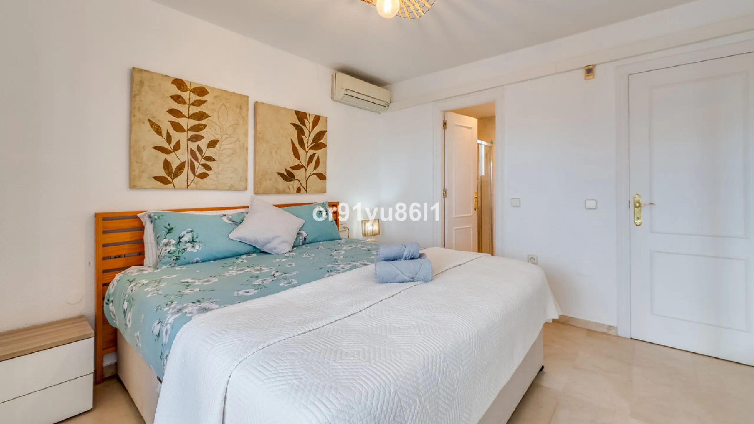 Townhouse Close to the Beach in Costabella Located within a gated, secure community in Costabella, just a short stroll from the beach, this three-bedroom, two-bathroom townhouse features a bright, spacious interior comprising a cosy living room with firep