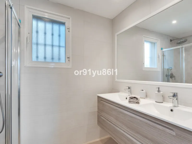 Townhouse Close to the Beach in Costabella Located within a gated, secure community in Costabella, just a short stroll from the beach, this three-bedroom, two-bathroom townhouse features a bright, spacious interior comprising a cosy living room with firep