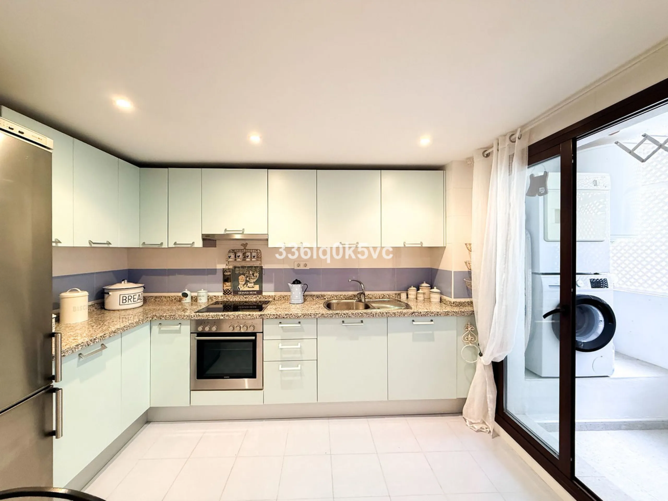 A beautifully presented 2 bedroom ground floor apartment in immaculate decorative condition, offering generous interior space, a private terrace, secure parking, and a full range of practical features for comfortable everyday living. Fully ready to move i