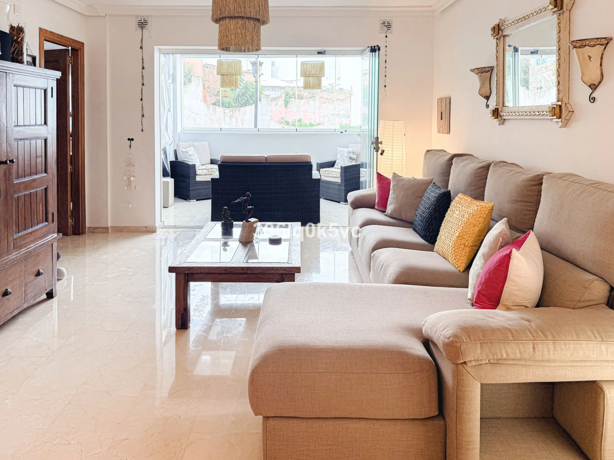A beautifully presented 2 bedroom ground floor apartment in immaculate decorative condition, offering generous interior space, a private terrace, secure parking, and a full range of practical features for comfortable everyday living. Fully ready to move i