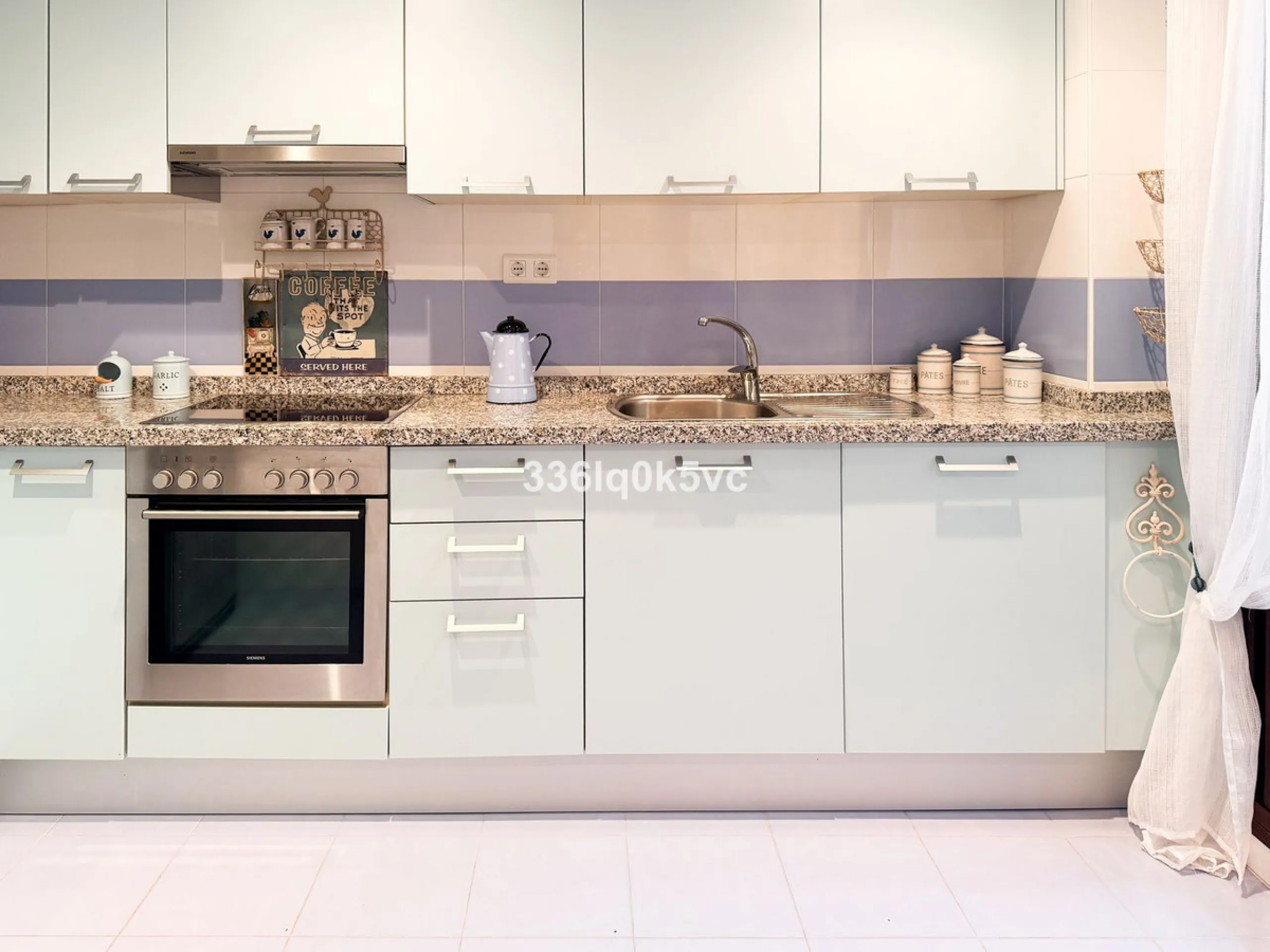 A beautifully presented 2 bedroom ground floor apartment in immaculate decorative condition, offering generous interior space, a private terrace, secure parking, and a full range of practical features for comfortable everyday living. Fully ready to move i