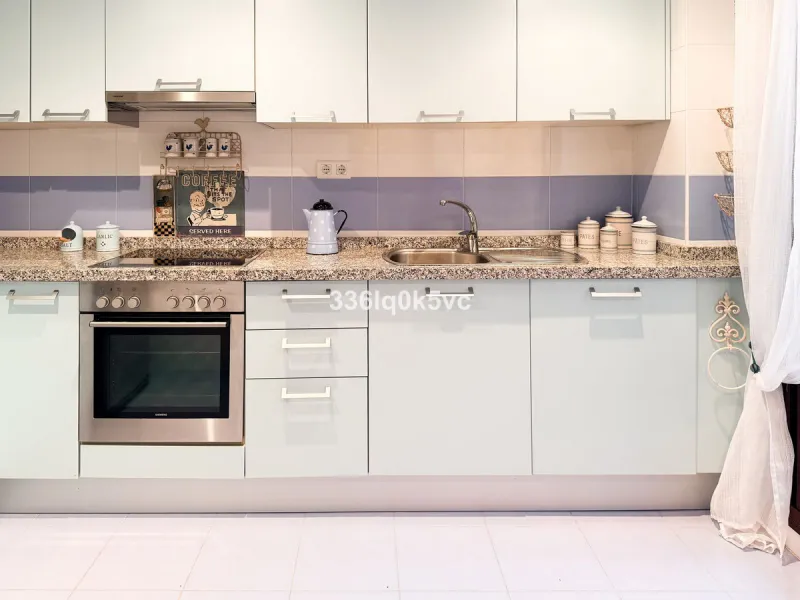 A beautifully presented 2 bedroom ground floor apartment in immaculate decorative condition, offering generous interior space, a private terrace, secure parking, and a full range of practical features for comfortable everyday living. Fully ready to move i