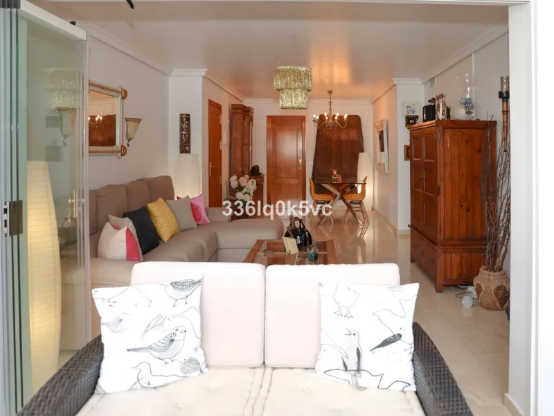 A beautifully presented 2 bedroom ground floor apartment in immaculate decorative condition, offering generous interior space, a private terrace, secure parking, and a full range of practical features for comfortable everyday living. Fully ready to move i
