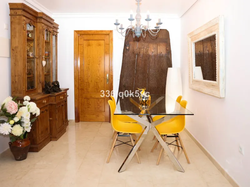 A beautifully presented 2 bedroom ground floor apartment in immaculate decorative condition, offering generous interior space, a private terrace, secure parking, and a full range of practical features for comfortable everyday living. Fully ready to move i