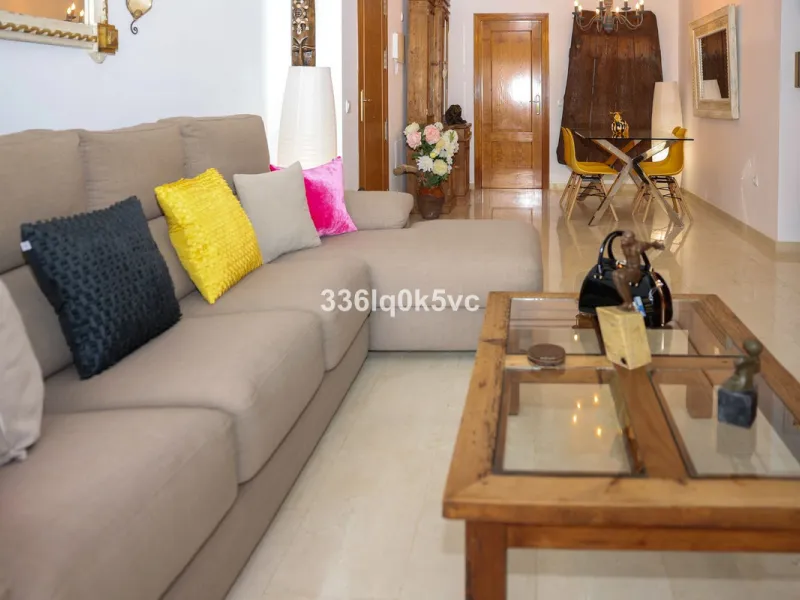 A beautifully presented 2 bedroom ground floor apartment in immaculate decorative condition, offering generous interior space, a private terrace, secure parking, and a full range of practical features for comfortable everyday living. Fully ready to move i