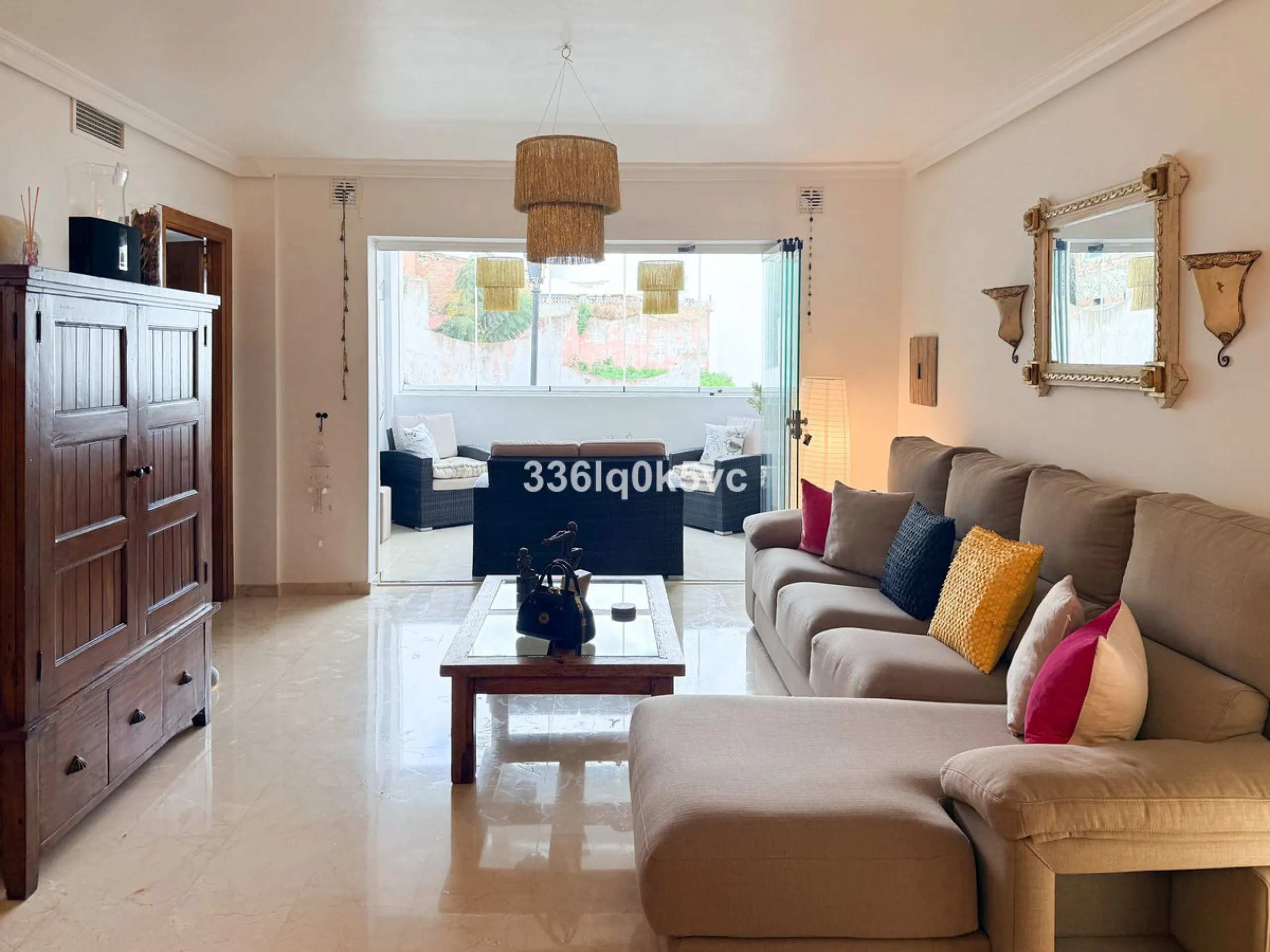 A beautifully presented 2 bedroom ground floor apartment in immaculate decorative condition, offering generous interior space, a private terrace, secure parking, and a full range of practical features for comfortable everyday living. Fully ready to move i