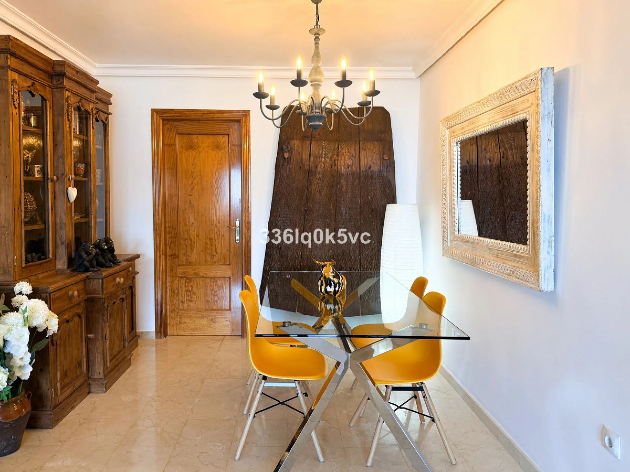 A beautifully presented 2 bedroom ground floor apartment in immaculate decorative condition, offering generous interior space, a private terrace, secure parking, and a full range of practical features for comfortable everyday living. Fully ready to move i