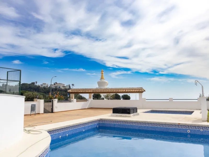 Spectacular Home with Sea Views, 2 Parking Spaces, and Private Office next to the Benalmádena Stupa