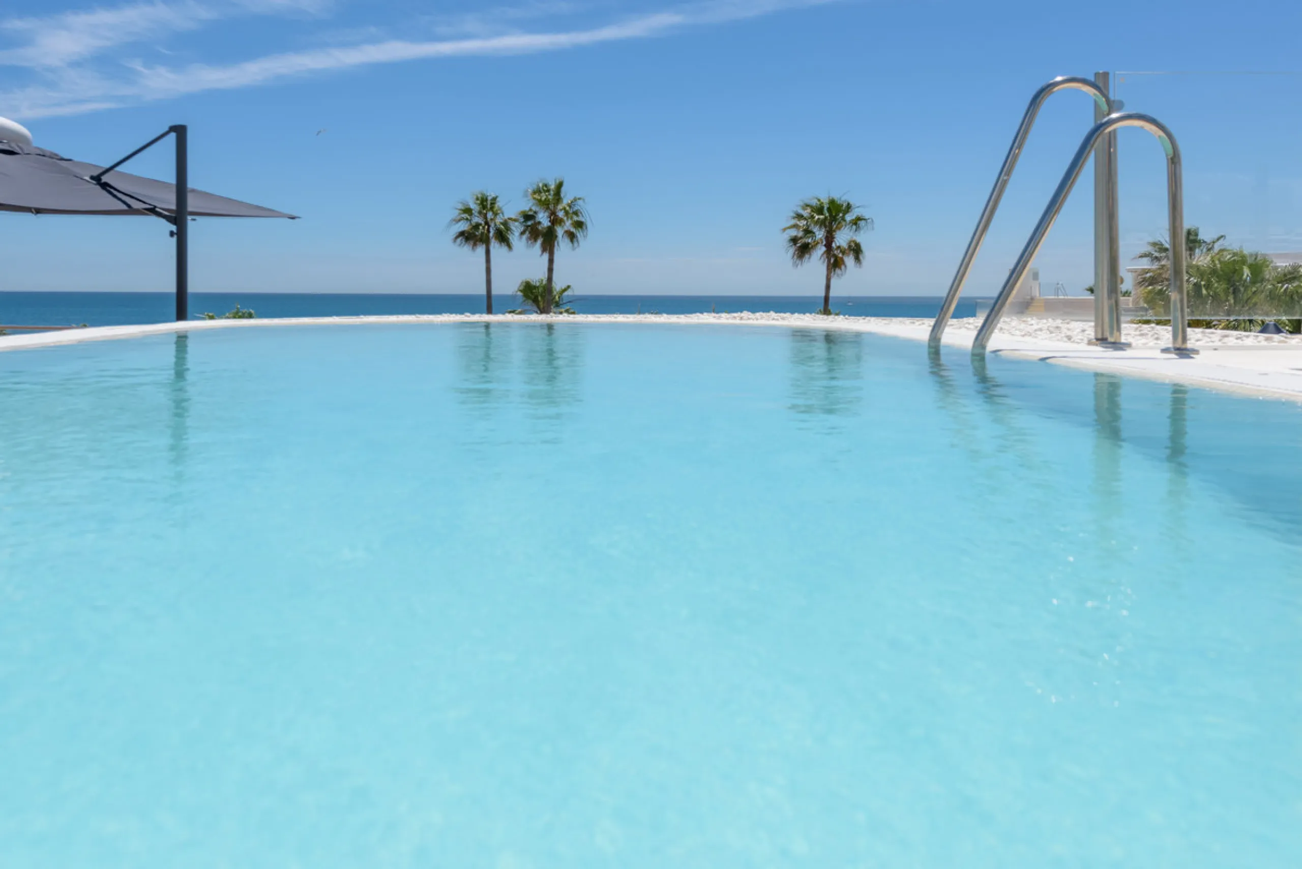 A three-bedroom penthouse located in one of Estepona's most prestigious frontline beach developments, offering uninterrupted Mediterranean views and contemporary coastal living.