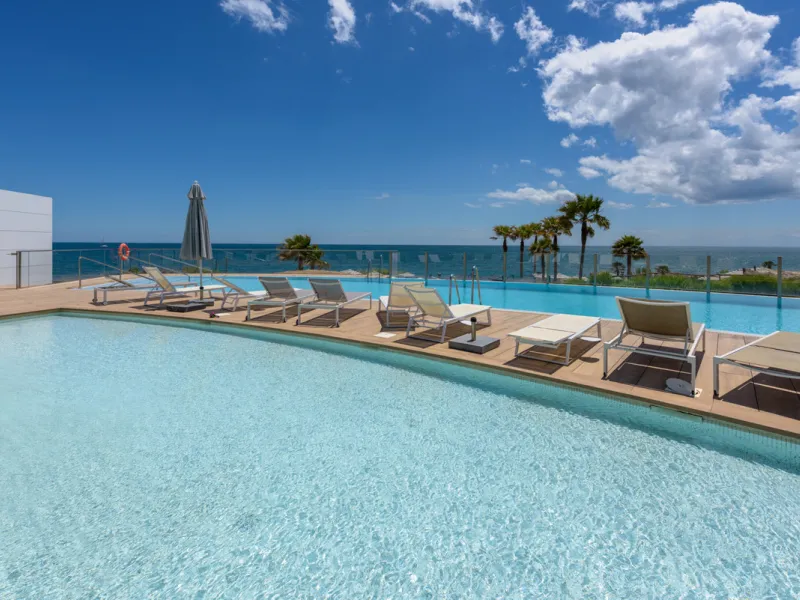 A three-bedroom penthouse located in one of Estepona's most prestigious frontline beach developments, offering uninterrupted Mediterranean views and contemporary coastal living.