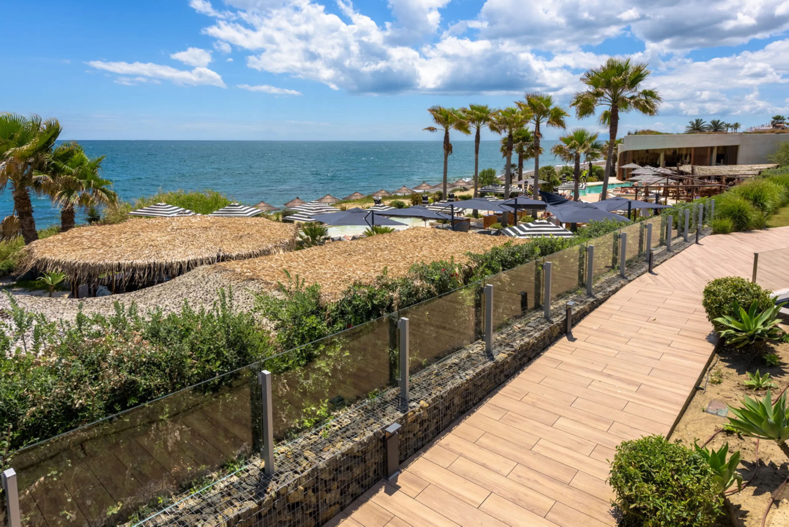 A three-bedroom penthouse located in one of Estepona's most prestigious frontline beach developments, offering uninterrupted Mediterranean views and contemporary coastal living.