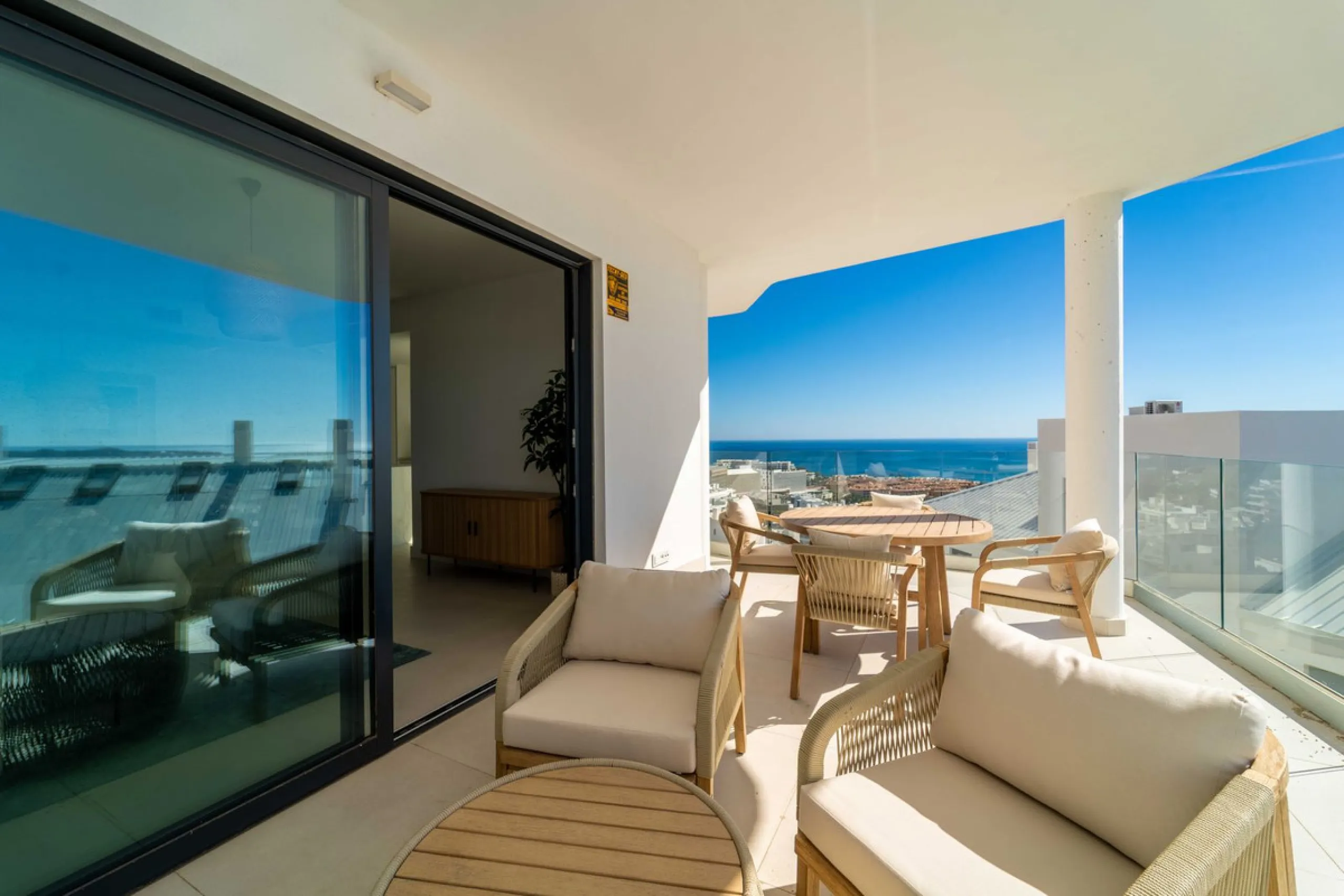 Modern three-bedroom apartment with panoramic sea views in an elevated position on the Costa del Sol.