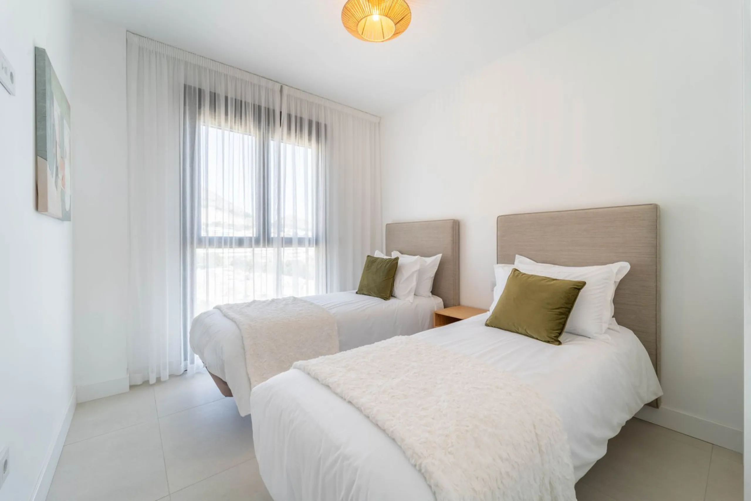 Modern three-bedroom apartment with panoramic sea views in an elevated position on the Costa del Sol.